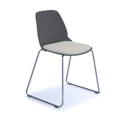 Strut chair with seat pad and chrome sled frame