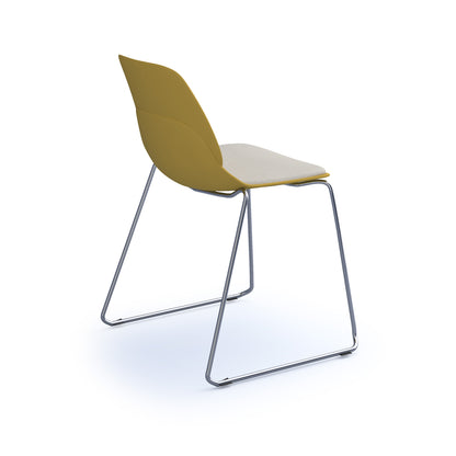 Strut chair with seat pad and chrome sled frame