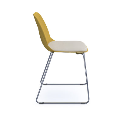 Strut chair with seat pad and chrome sled frame
