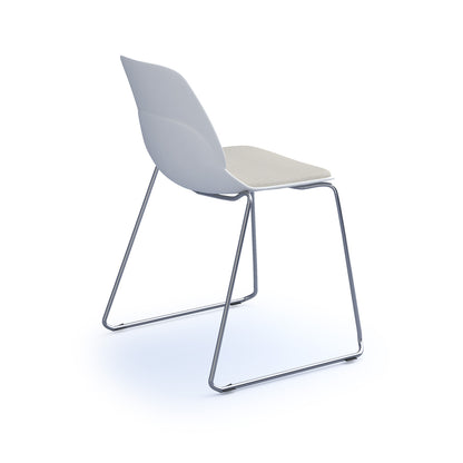 Strut chair with seat pad and chrome sled frame