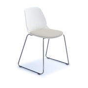 Strut chair with seat pad and chrome sled frame